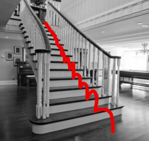 staircase with a red line walking down it