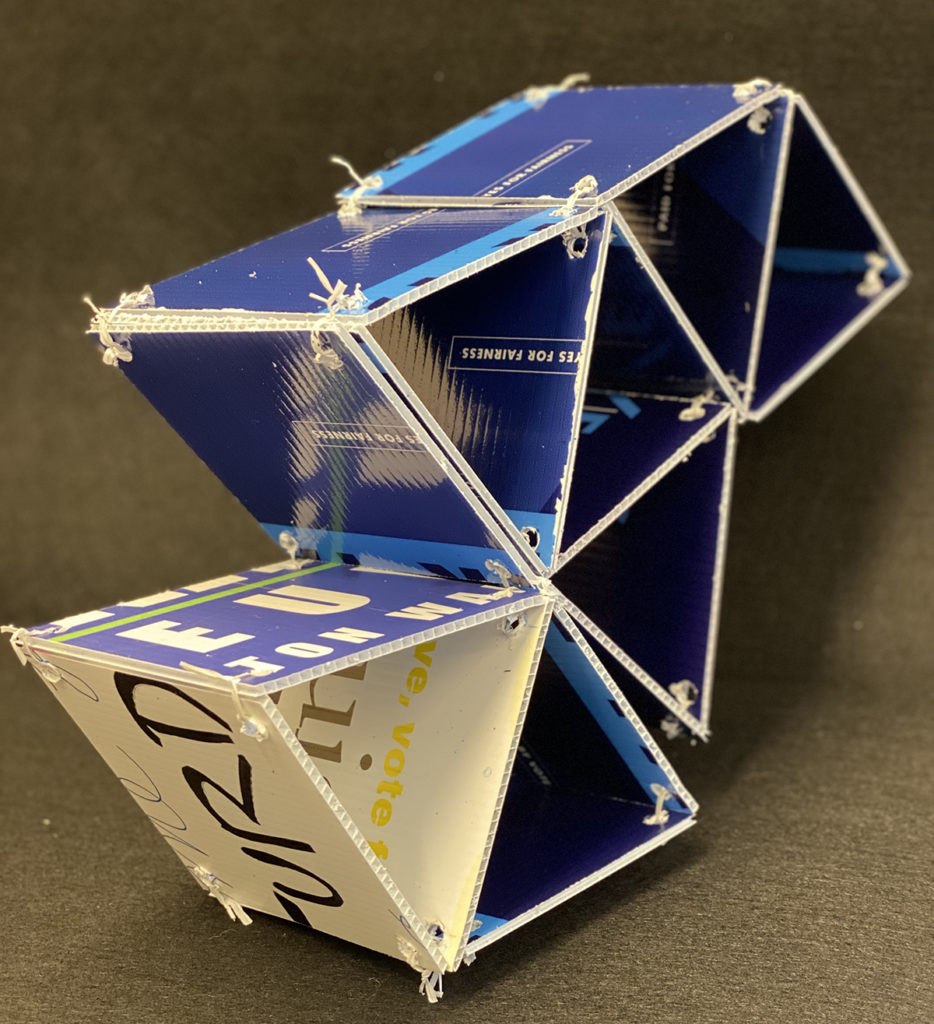 plastic square building blocks into a shape of triangles, blue and white
